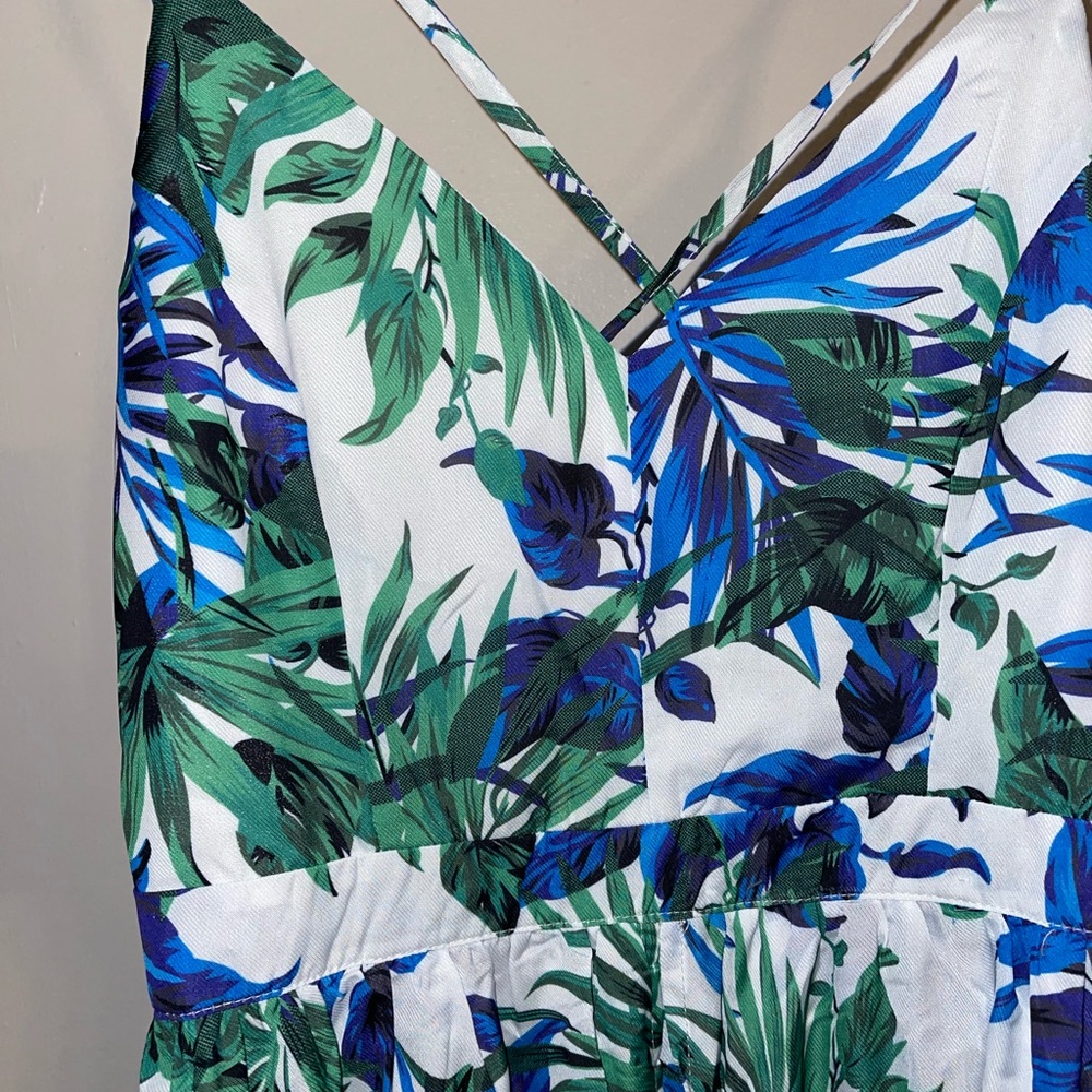 Brand new fashion nova dress. long dress, cross straps on the back. never worn